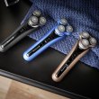 Електрична бритва роторна Remington X7 Limitless X, 3 головки для бриття, мережа, сухе/вологе бриття, тример, водонепроникна, чорно-синя (XR1775)