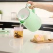 Електрочайник Russell Hobbs Eden, 1.7л, нержавіюча сталь, пластик, фісташковий (27364-70)